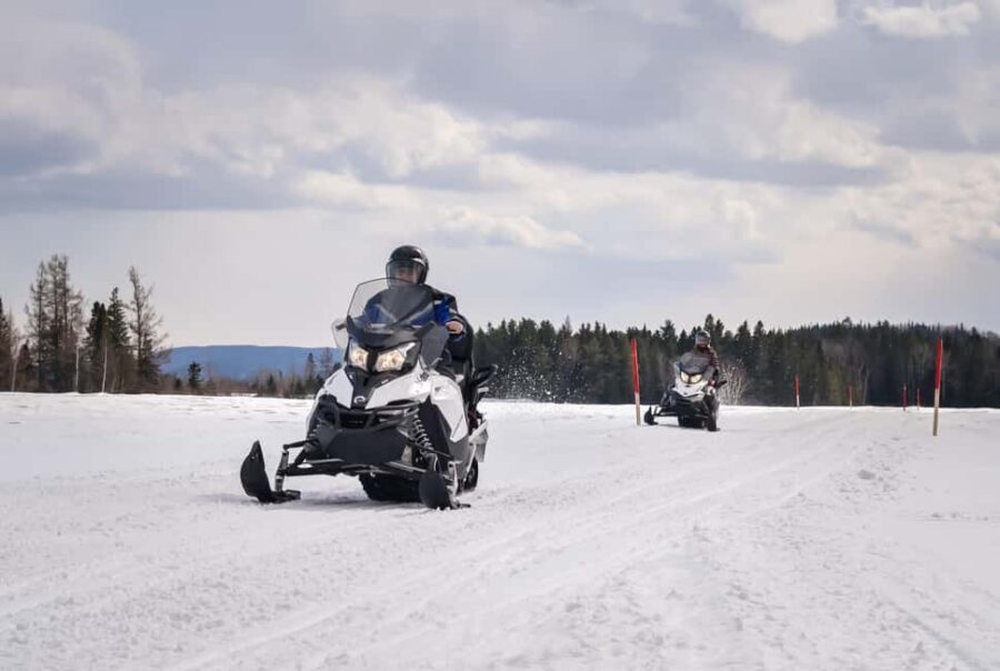 15 min. Tadoussac: Snowmobile Expedition in Saguenay Fjord - Before you start moving: briefing, instructions, and gear up