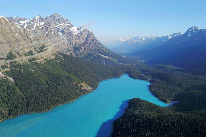 4-Day Canadian Rockies & Banff Classic Summer Tour - Banff town time: Bow Falls, Banff Ave, and a hotel on the action