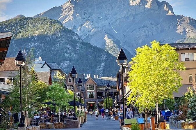 Banff Gondola Hot Springs Bow Falls and Three Lakes tour - Banff Avenue lunch break: souvenirs and a breather