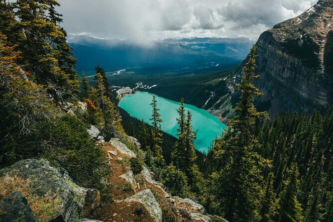 Banff Top Lakes and Banff Town Day Trip From Calgary - Lake Minnewanka (optional): boats in summer, winter fun on the ice