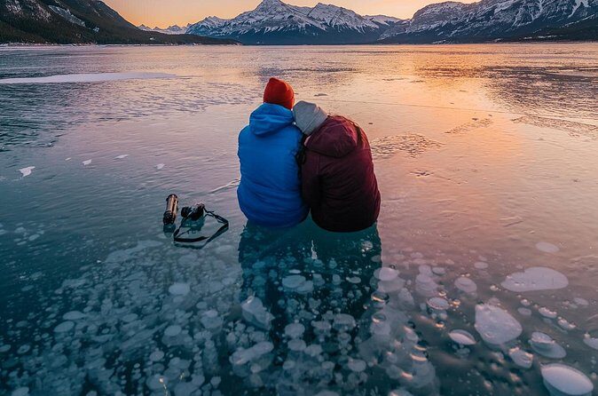 Canadian Rockies Abraham Lake Ice Bubbles Helicopter Tour - Abraham Lake Bubbles Walk: Ice Cleats, Methane, and a Frozen-Legend Feeling