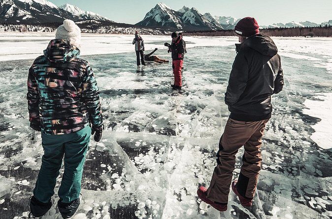 Canadian Rockies Abraham Lake Ice Bubbles Helicopter Tour - Warming Up by the Fire: Marshmallows and the Human Side of the Day