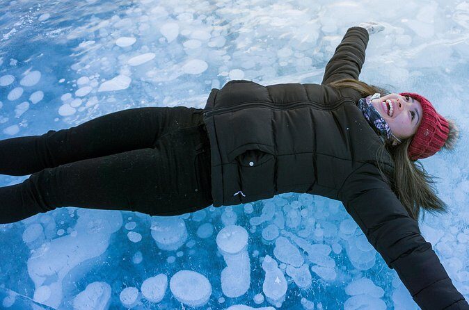 Canadian Rockies Abraham Lake Ice Bubbles Helicopter Tour - Weather Risk: When Cloudy Days Change the Day