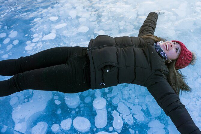 Canadian Rockies Abraham Lake Ice Bubbles Helicopter Tour - Cline River Heliport: Your Morning Starts Warm and Practical