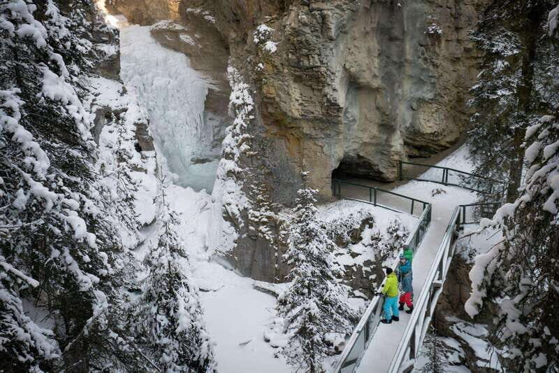From Banff: Johnston Canyon Guided Icewalk - Upper Falls Cathedral of Ice: the finale that feels like a reward