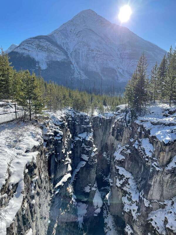 Kootenay: From Icy Mountain Rivers to Steamy Hot Springs - Calgary Start: Great Divide Photo Stop and Drive Time