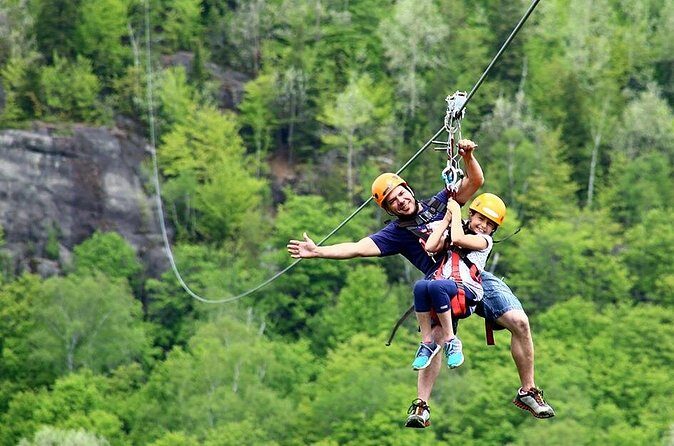 Mont-Catherine Ziplines and Via Ferrata - The first zipline: 900 meters of cliff-spanning speed