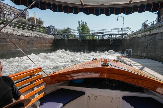 Montreal: Guided Exclusive Electric Boat Tour on Lachine Canal - Entering the Lachine Canal story the easy way