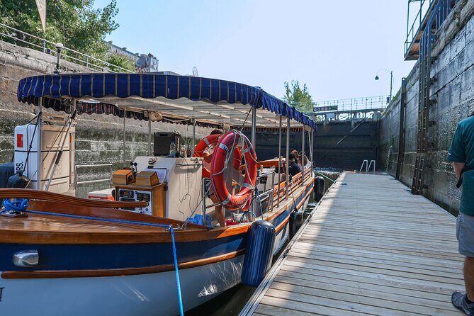 Montreal: Guided Exclusive Electric Boat Tour on Lachine Canal - Silo #5 at Pointe-du-Moulin-à-vent: industrial engineering on a jetty