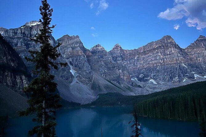 Moraine Lake, Lake Louise, and Lake Minnewanka Banff sunset Tour - Moraine Lake alpenglow (June 1–Oct 13) and the rockpile moment