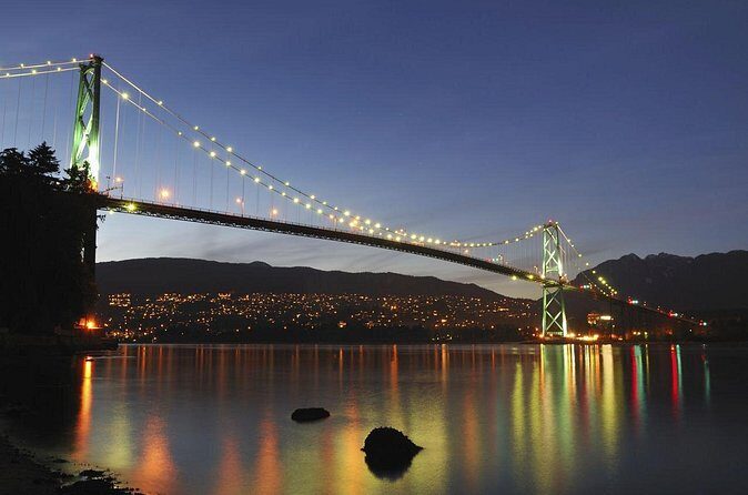 New Year's Eve Dinner Cruise through Vancouver Harbor - The Skyline Stops: Bridge at Night and a Landmark Lit Up