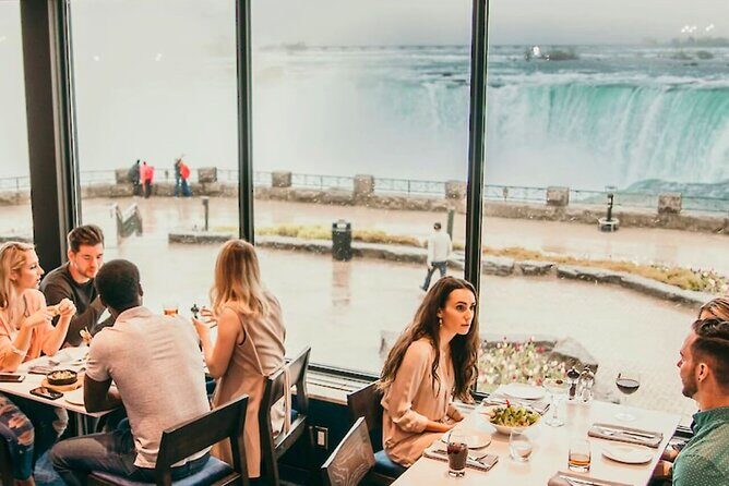 Niagara Falls Evening Tour with Boat, Dinner & Illumination Tower - Hornblower-style boat cruise: misty fun, not a dry postcard