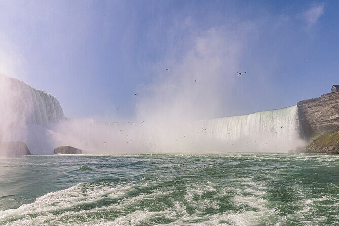 Niagara Falls Tour with Boat Ride & Journey Behind the Falls - Journey Behind the Falls at Table Rock: caves, stairs, and a ledge view