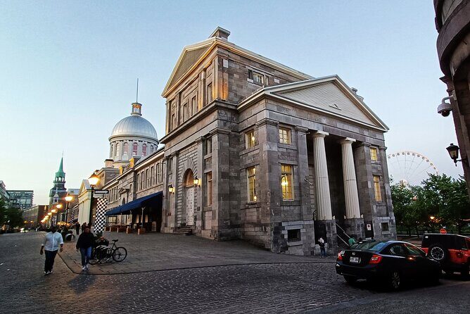 Old Montreal at Twilight Walking Tour Semi-Private - Start at Place d’Armes Square, right where you can orient