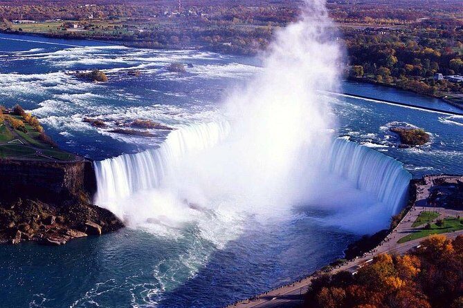 One hour Aerial Tour of Toronto and Niagara Falls with iflyTOTO - Toronto from the sky: CN Tower, Rogers Centre, and the skyline pass