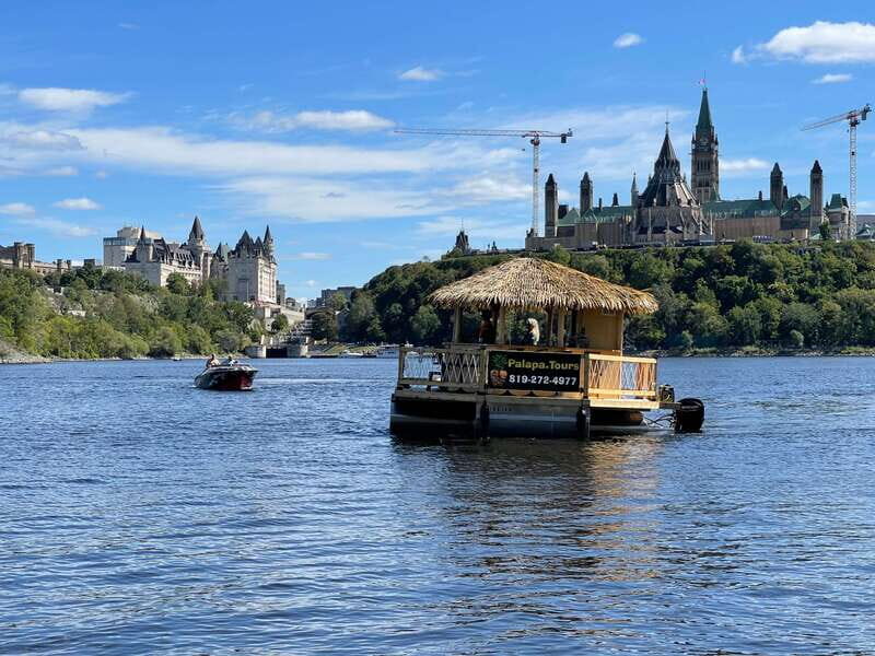 Ottawa: Floating Tiki Bar Cruise on the Ottawa River - Entering the Palapa Dock near Parliament Hill and the Ottawa Locks