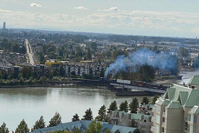 Private Guided Grand City Tour in Vancouver with your luggage - Steam Clock, Edgemont Village Wines, and the Olympic torch: small moments with big mood