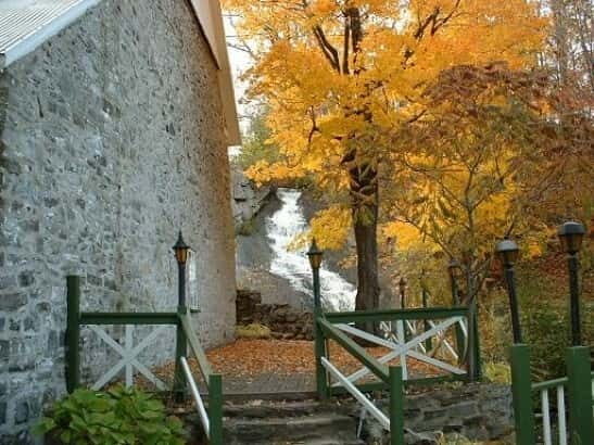 Quebec: City Tour, Montmorency Falls & Île d'Orléans Tour - The Price Building and City Landmarks: Modern Quebec in the Same Breath