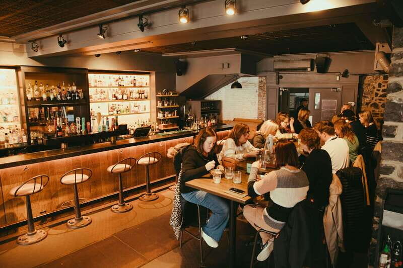 Quebec: Old Quebec City Food Tour with 10+ Local Tastings - Walking into a 200-year-old house bistro stop with wine