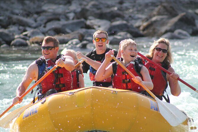 Rafting on Athabasca River Mile 5 in Jasper - Where the Athabasca meets the Miette: the color-change moment