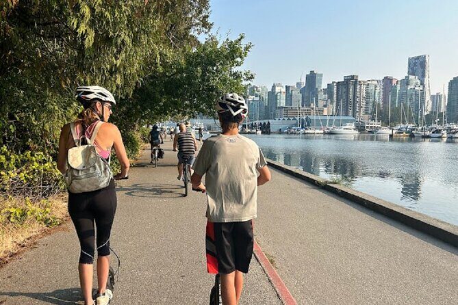 Stanley Park Seawall E-scooter Rental with Self Guided map - Lost Lagoon: The Pause for Birds, Turtles, and Still Water