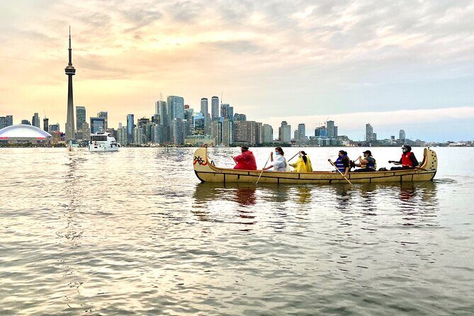 Sunset Canoe Tour of the Toronto Islands - Voyageur canoe basics: team paddling, life jackets, and a guide in the same boat