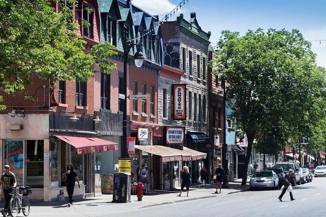The Original Montreal Mural Arts Tour by Spade & Palacio - Stop 2: the Leonard Cohen mural stop that anchors the whole tour