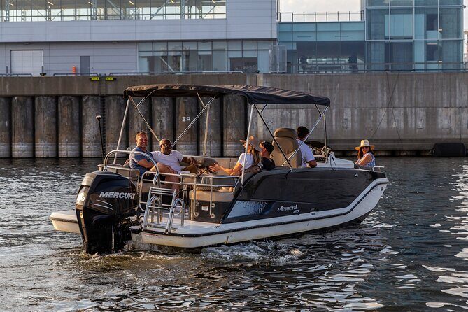 The Ultimate Montreal Boat Tour – Fall Colors Apéro Edition - Old Port Montreal and downtown skyline from the water