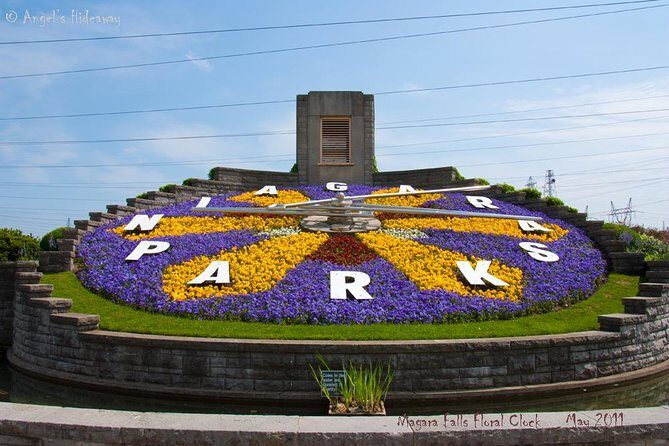 Toronto Airport to Niagara Falls Tour, Boat Ride and Journey - Floral Clock and Niagara Parkway: a fun stop with timing tricks