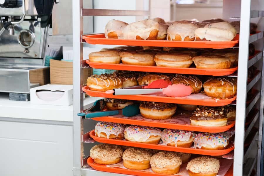 Toronto: Guided Donut Walking Tour with Tastings and Coffee - Queen Street to Bloomer’s: coffee breaks plus downtown context