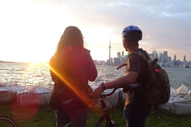 Toronto Islands Evening Bike Tour - Sunset views: skyline lights, beaches, and photo breaks