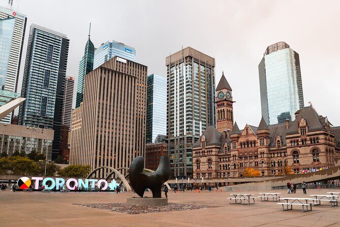 Toronto Private Custom Tour with a Local Highlights & Hidden Gems - Stop 4: Old City Hall (1899)—Romanesque civic landmark stories