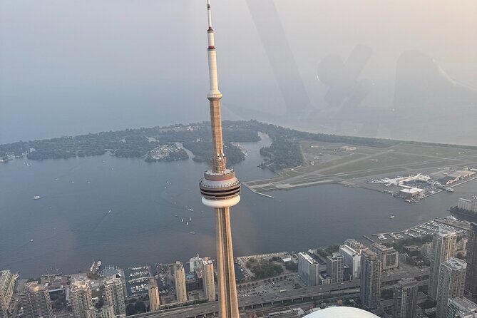 Toronto Skyline Helicopter Tour CN Tower Loop - Flight Stop 1: Circling the CN Tower Higher Than the Usual Views