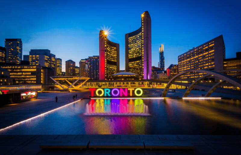 Toronto: Small Group Night Tour with Harbour Boat Cruise - Downtown after dark: Yonge/Dundas Square and the Toronto sign