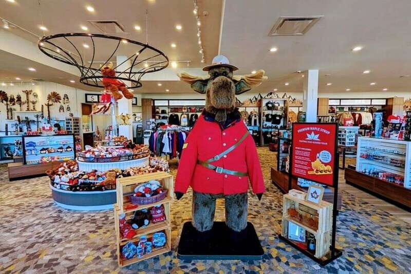 Toronto to Niagara Falls: Boat Ride & Behind the falls Tour - Canadian side extras: floral clock, Niagara Whirlpool, and photo stops
