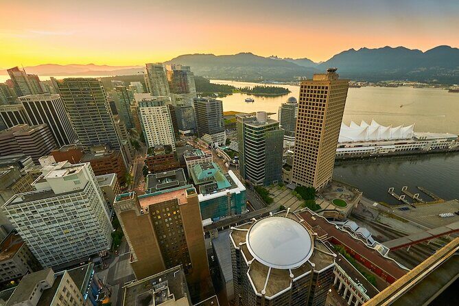 Vancouver Small Group Night Tour w/Capilano + Grouse Mtn Dinner - Capilano Suspension Bridge Park: the 230-foot swing moment