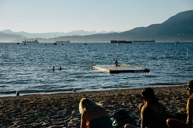 Vancouver Sunset and City Lights Trolley Tour - Stop 1: Brockton Point Totem Pole in Stanley Park